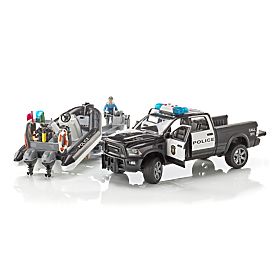 Bruder RAM Policijski avto s čolnom in dvema figurama