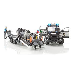 Bruder RAM Policijski avto s čolnom in dvema figurama